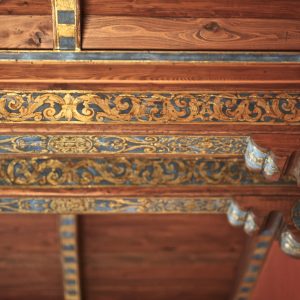 intricate painting on ceiling beams